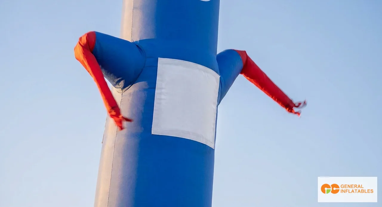 Outdoor close-up of a tall commercial air dancer with bold solid-color branding on the mid-chest section, deployed at a retail storefront